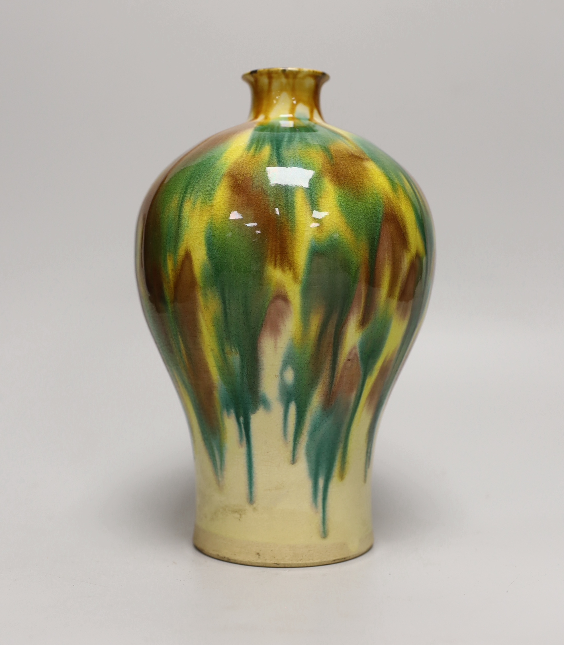 A Chinese pottery vase, stamped to base, 22cm